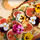 Butter board with figs and edible flowers